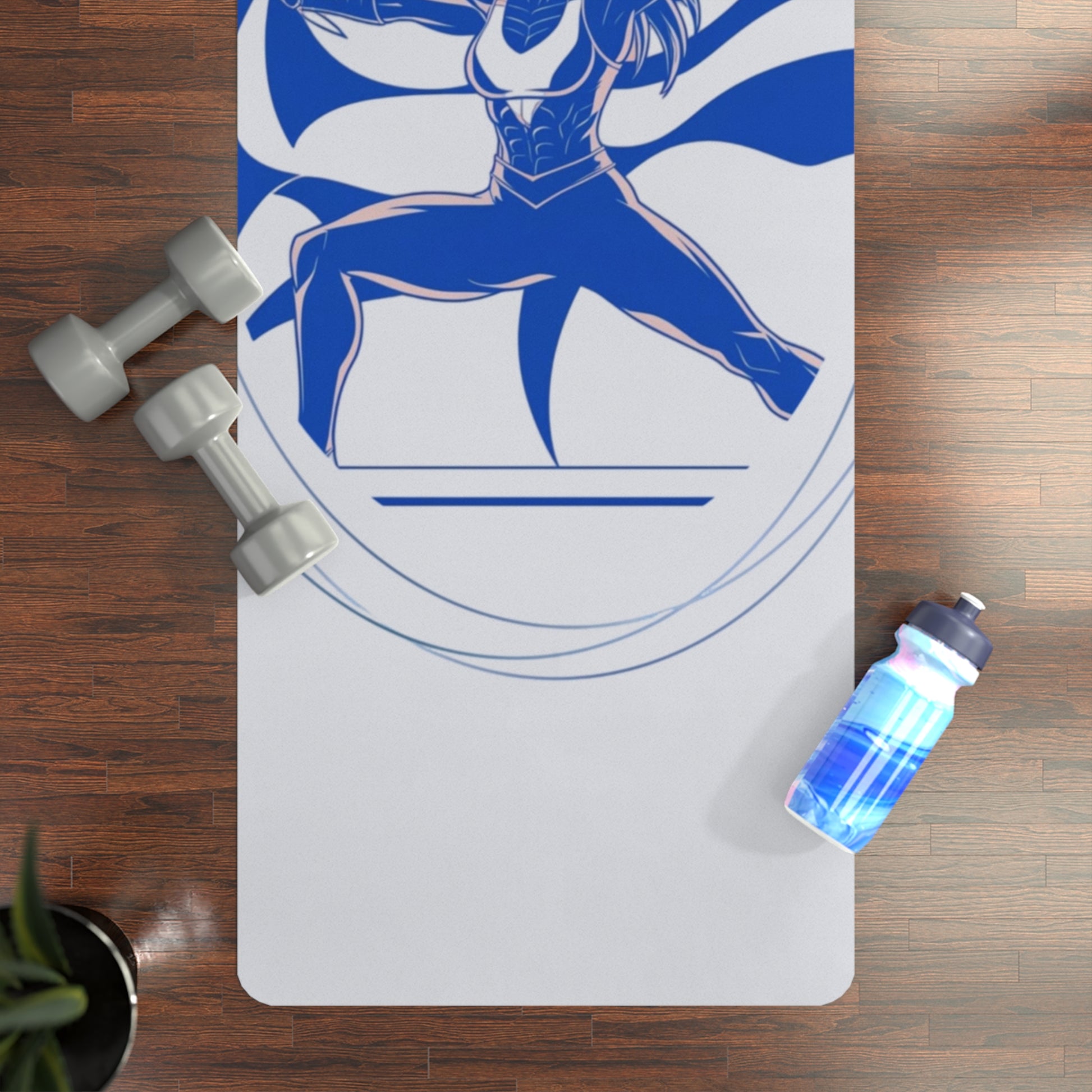 Yoga mat with superhero design, dumbbells, and water bottle on a wooden floor