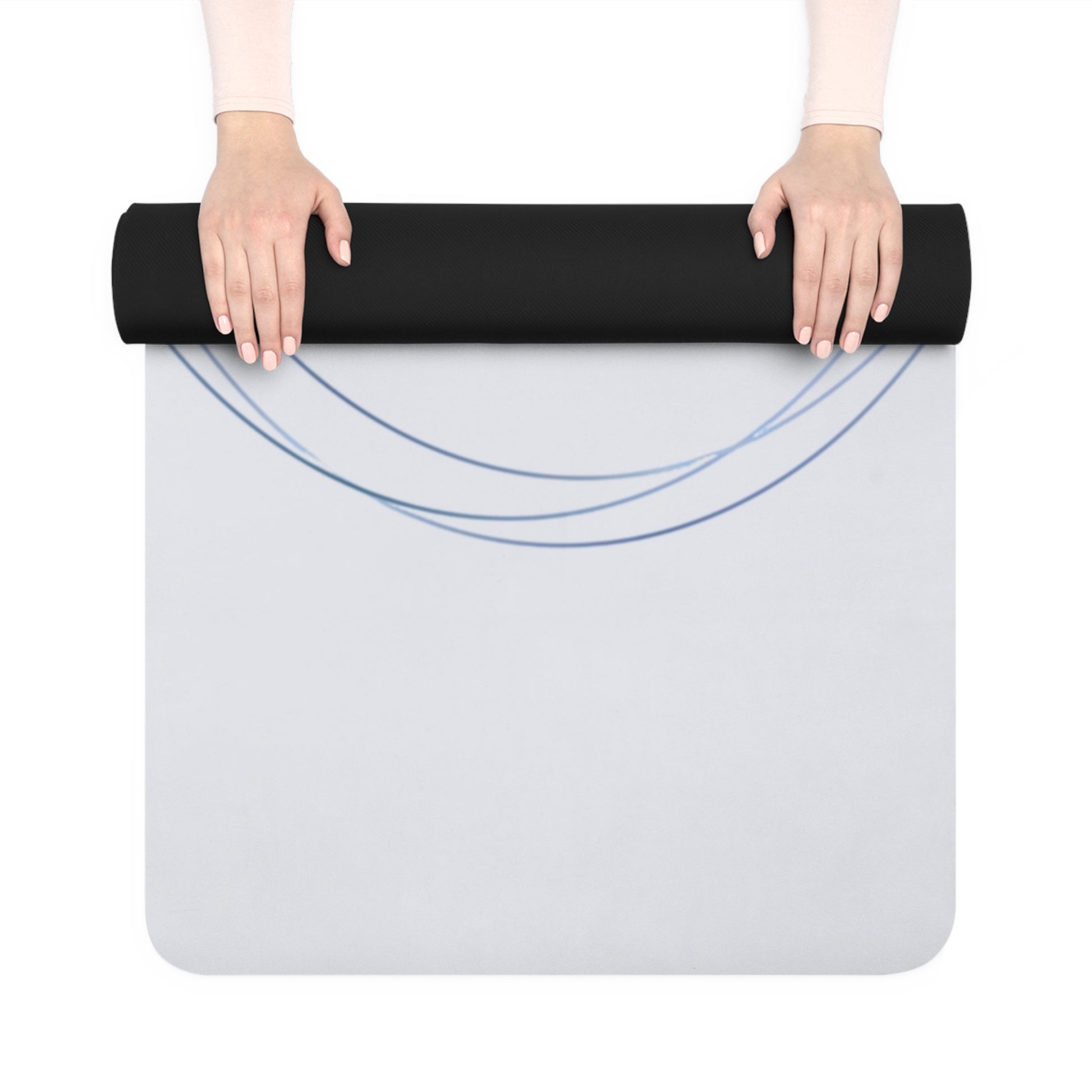 Person holding a black yoga mat over a clear mat with blue lines on a white background