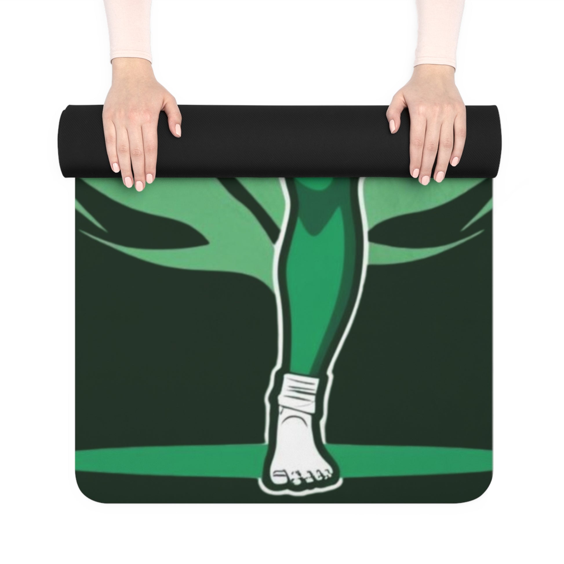 Yoga mat with green leg design held by hands on a white background